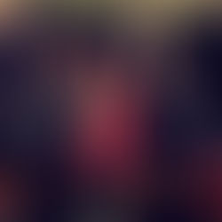 A band stands in front of a dark, fiery backdrop. The center figure in red poses energetically. Text reads "Leaving Eden" above them.