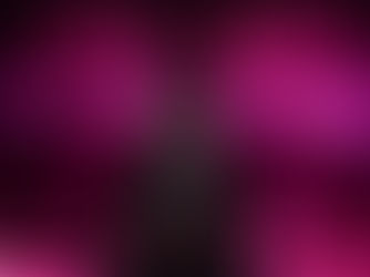 Performer in vibrant outfit sings under pink stage lights, holding microphone. Energetic mood with dynamic lighting and patterns.