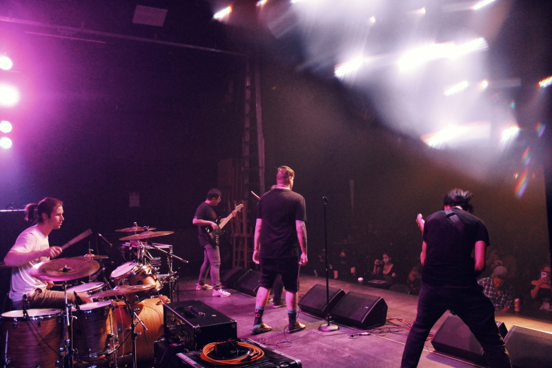 Photo of the Manitoba metalcore band Planeshifter, performing on The Park Theatre stage.