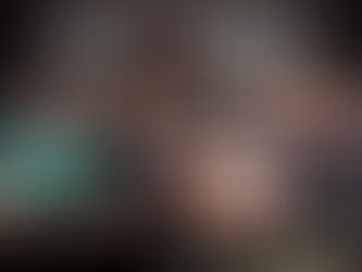 Four men sit casually on a couch, laughing and gesturing. Bold letters above read "TAKE IT OR LEAVE IT." The mood is relaxed and playful.