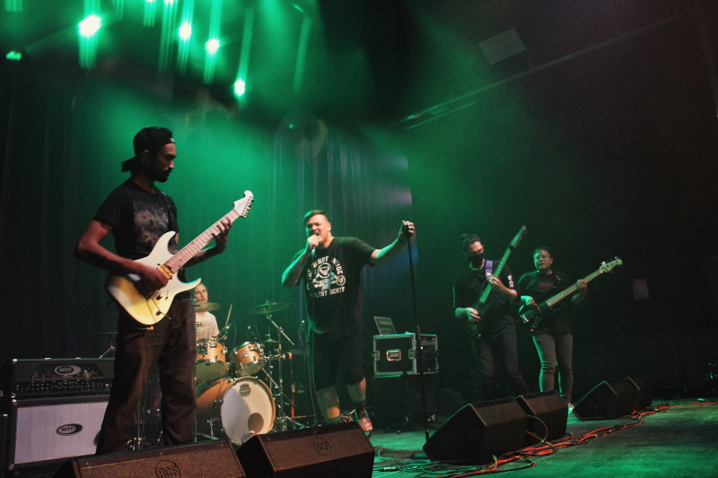 Photo of the Manitoba metalcore band Planeshifter, performing on The Park Theatre stage.
