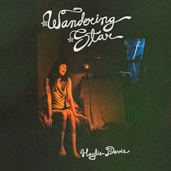 Album cover with a woman sitting in a dim room, titled Wandering Star by Haylie Davis.