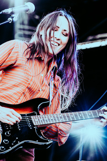 Paige Drobot performing at the Burt Block Party.