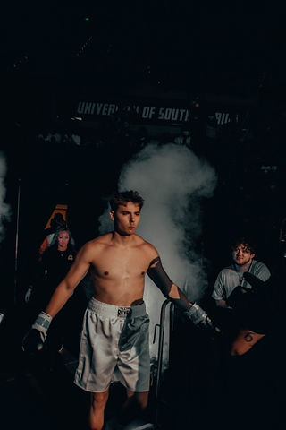 Influencers, creators, and youtubers boxing for charity at Yuengling Center in Florida as part of the Creator Clash event.