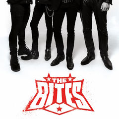 Four people in black pants and boots stand on a white background above the red THE BITES logo.