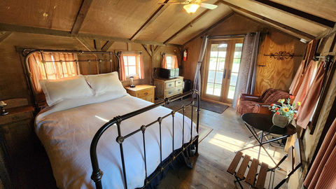 Rustic cabin bedroom with queen bed