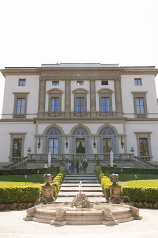 Grand exterior facade with fountain and manicured gardens at Villa Cora, a stunning Italy wedding venue in Florence.