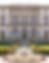 Exterior facade of Villa Cora in Florence, Italy, featuring neoclassical architecture, ornate stone balustrades, arched ground-floor windows, and a formal garden with a sculpted fountain in the foreground — a premier destination wedding venue in Tuscany.