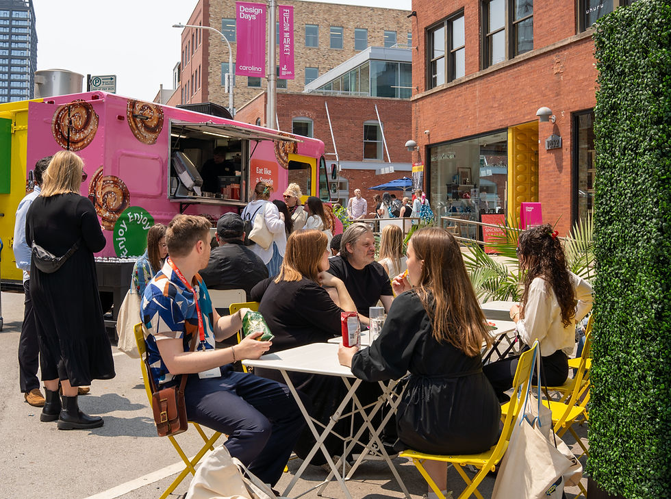 Customers enjoying food and drink from a brand activation food truck