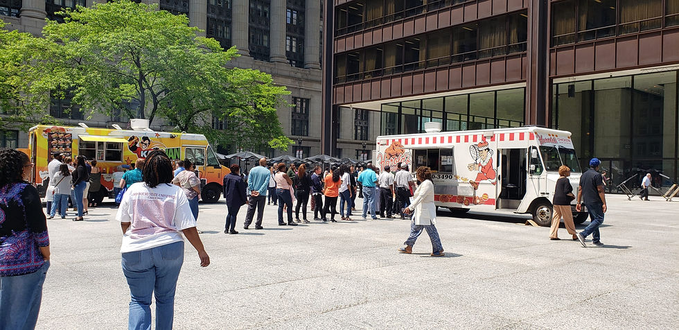 downtown plaza lunch line at a truck window
