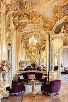 Ornate gilded salon with purple velvet seating and mirrored walls at Villa Cora, a luxurious Italy wedding venue.