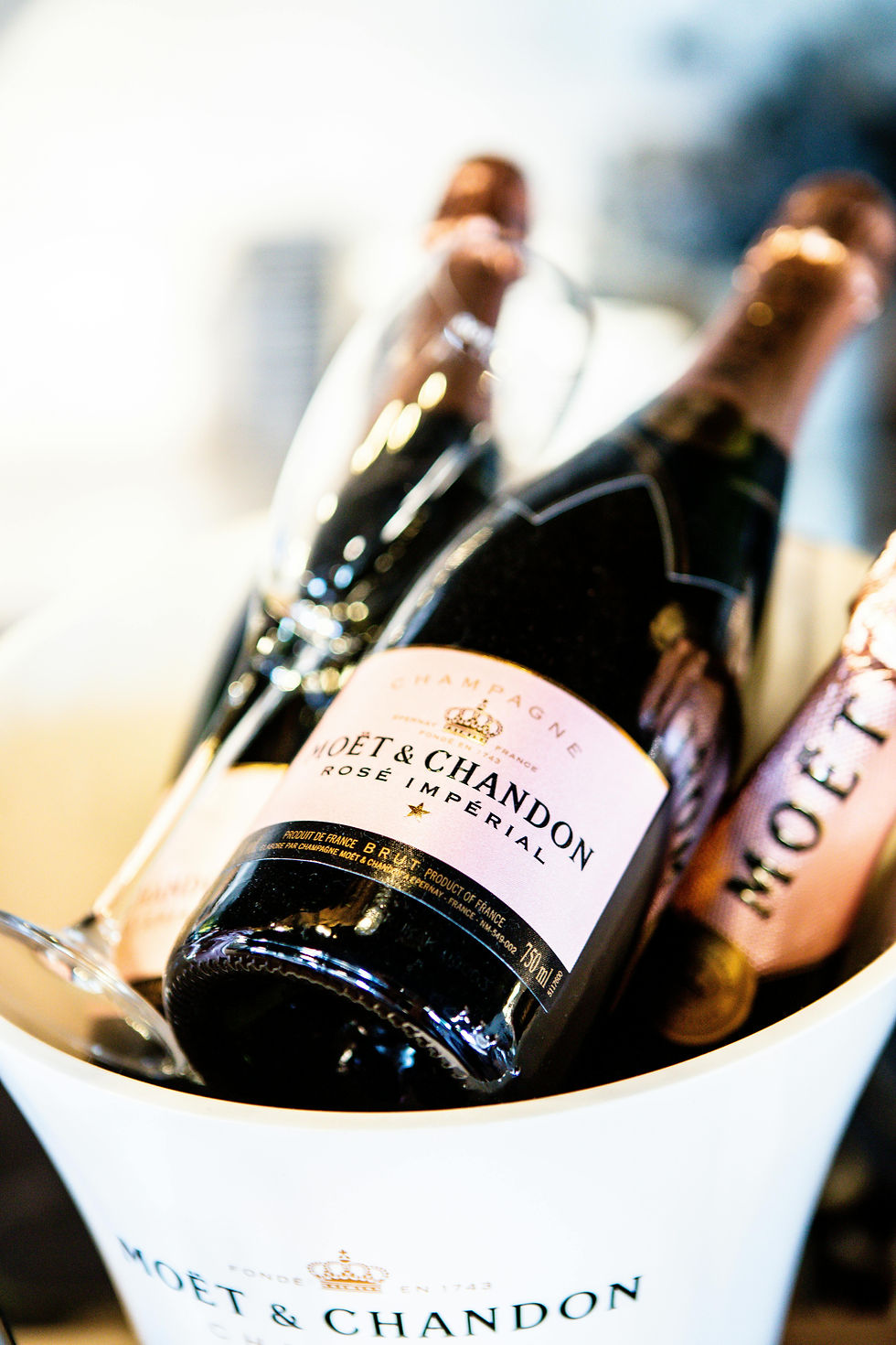 Bottles of champagne in an ice bucket