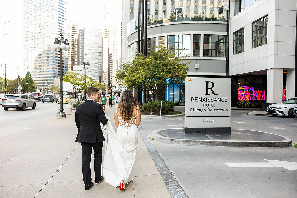 Bride and groom walking in the street