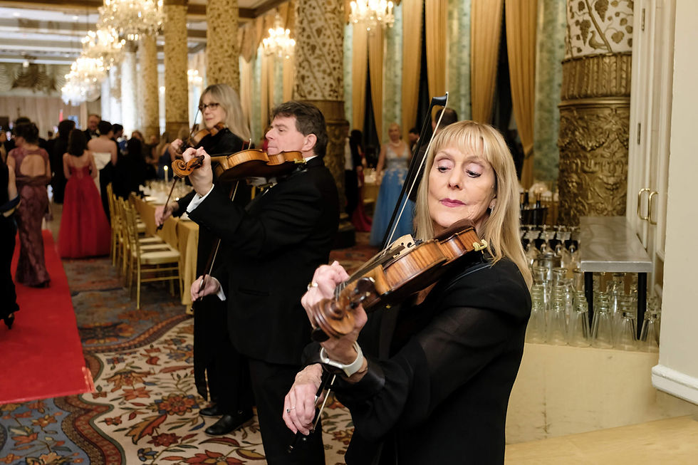 String music being played to welcome guests to wedding reception