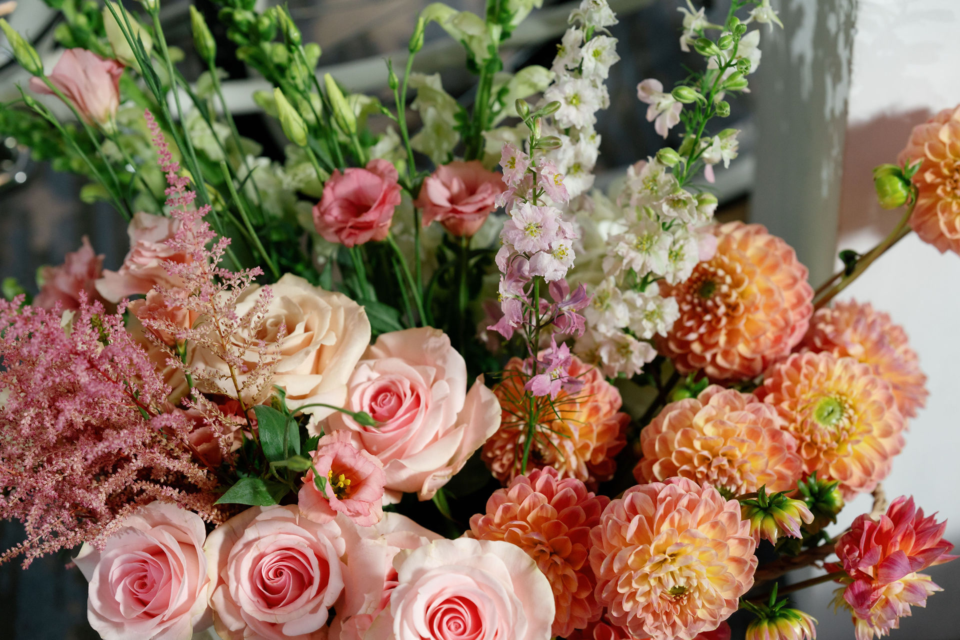 Bouquet of pink, orange, cream and white flowers