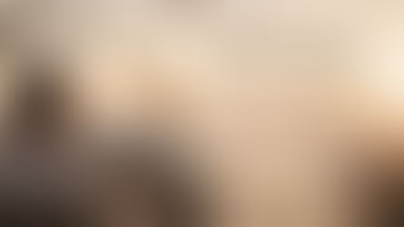 elderly woman looking towards the sunset
