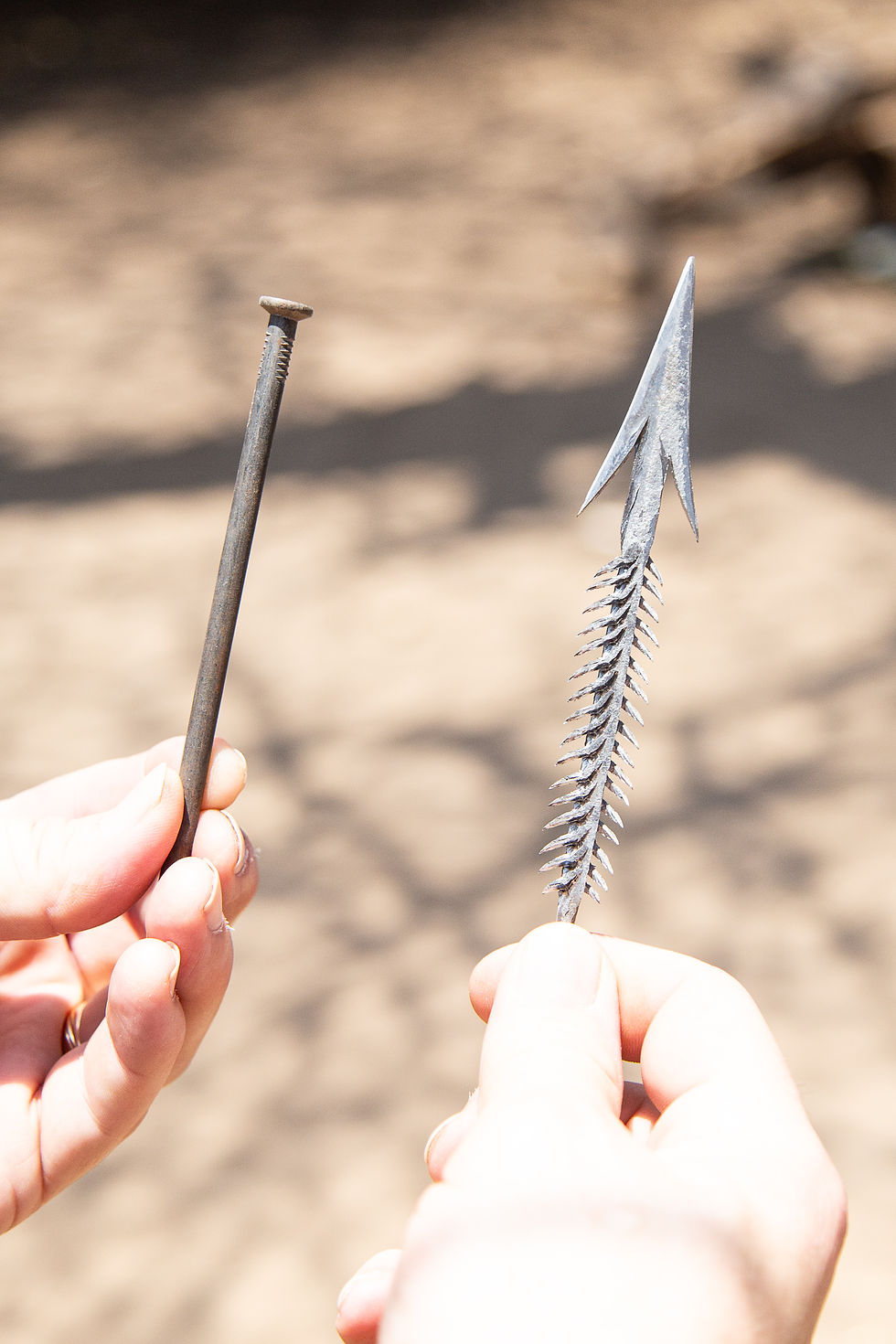 A barbed arrowhead made from a simple nail.