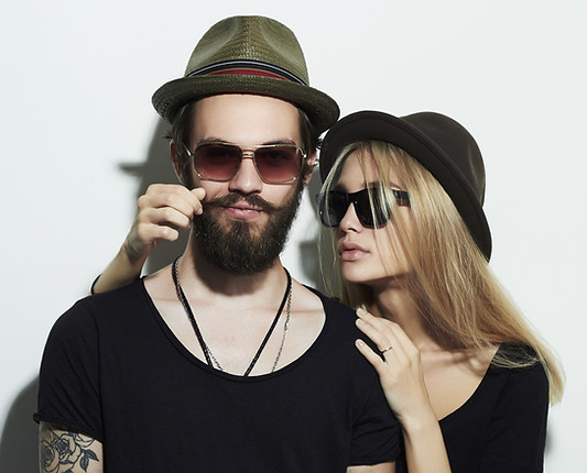 Woman stroking her partners beard after using Omalani Beard Balm