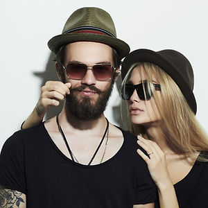 Couple Wearing Hats and Sunglasses