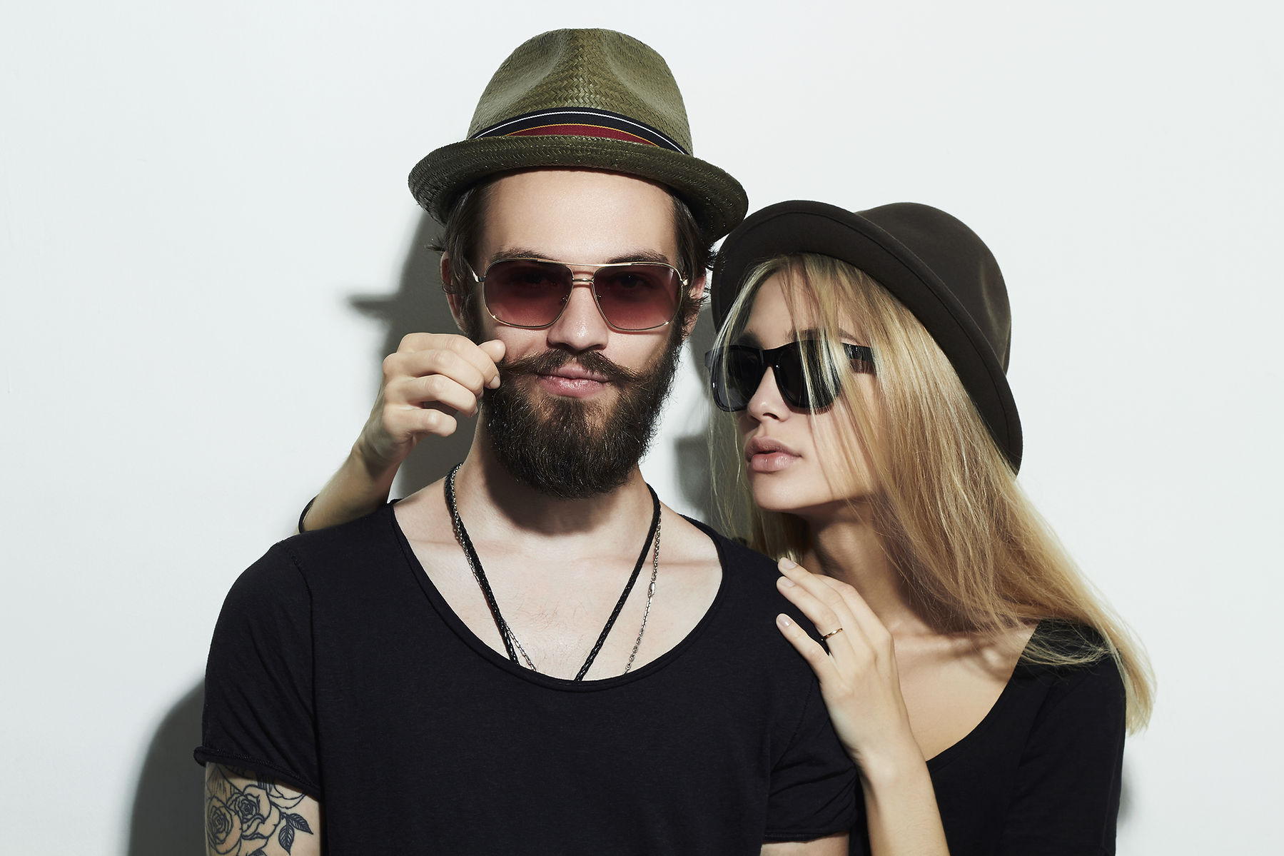 Couple Wearing Hats and Sunglasses
