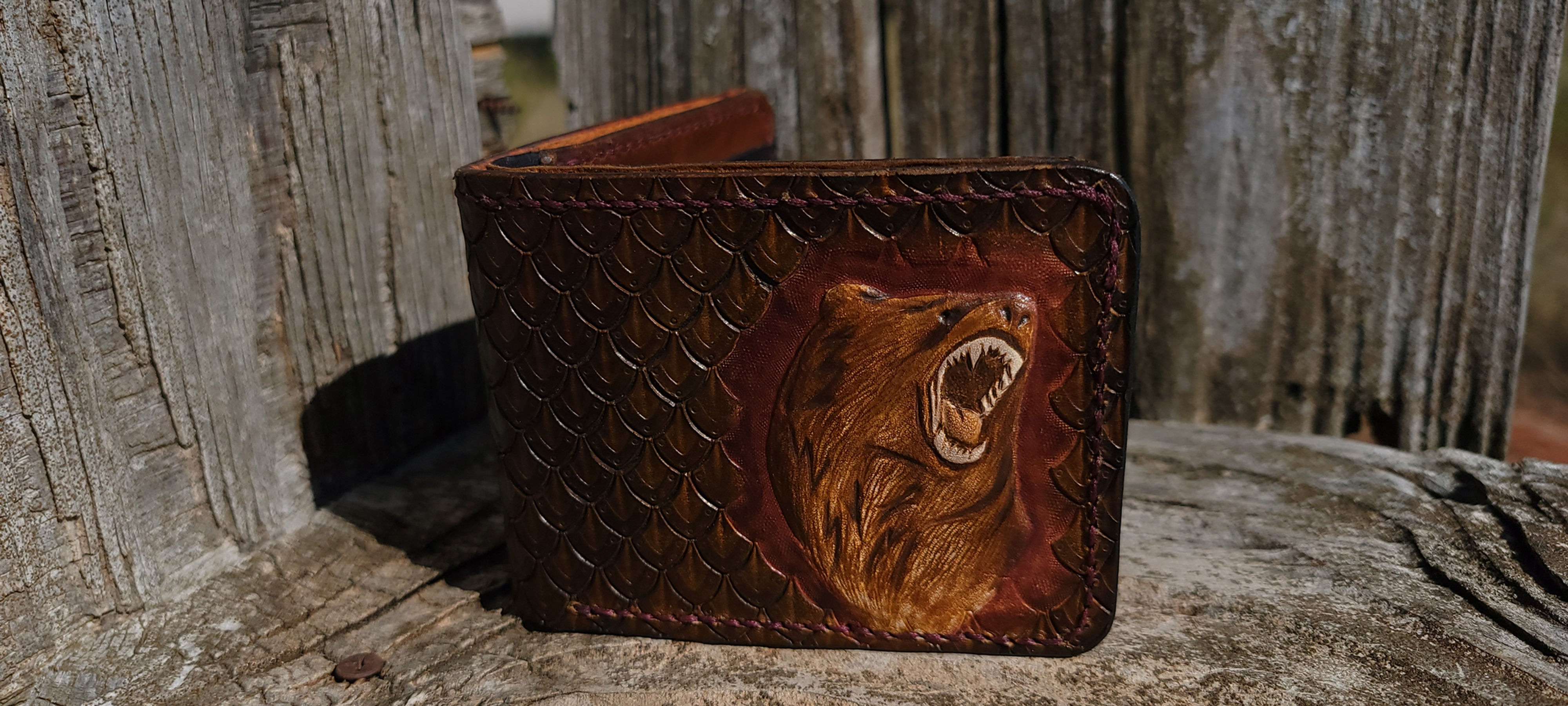 Bifold wallet with raised Grizzly Bear