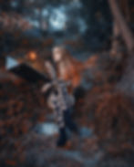 Dark elf with floating open book