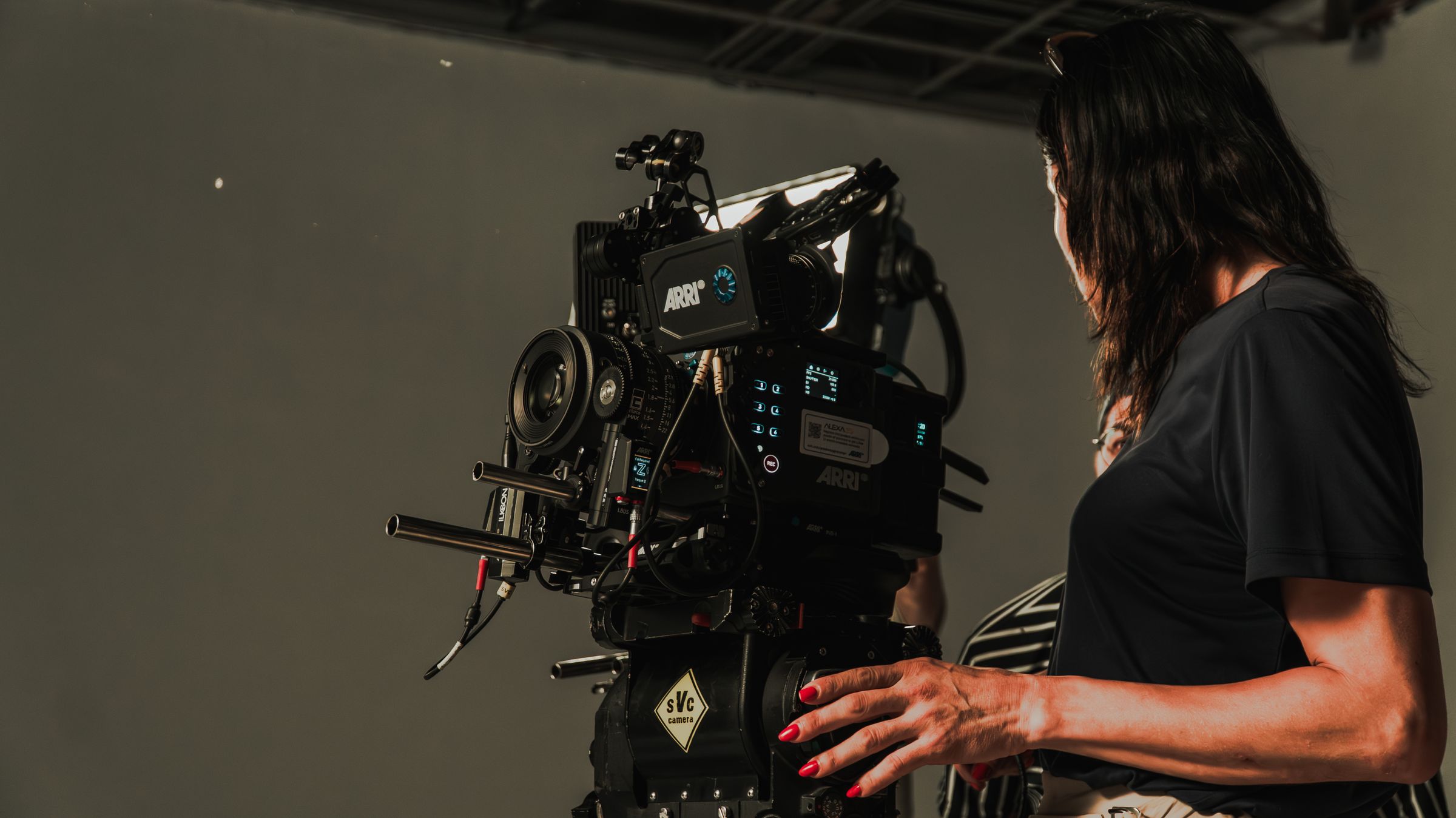 Professional camera crew operating a cinema camera on an active EquiFilms production set.
