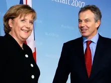 Angela Merkel alongside Tony Blair