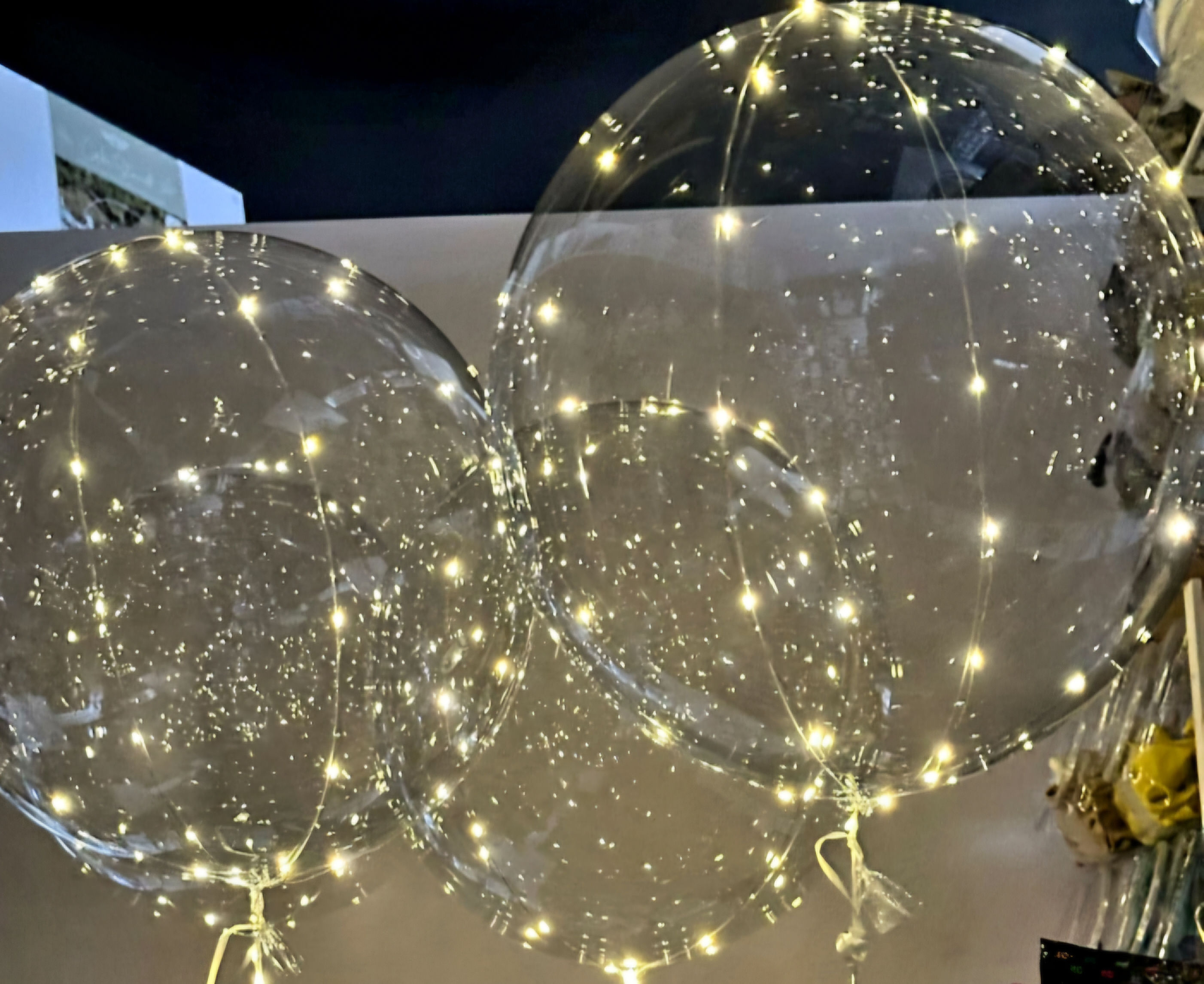 1 Bobo balloons 18" filled with helium with lights wrapped round balloon