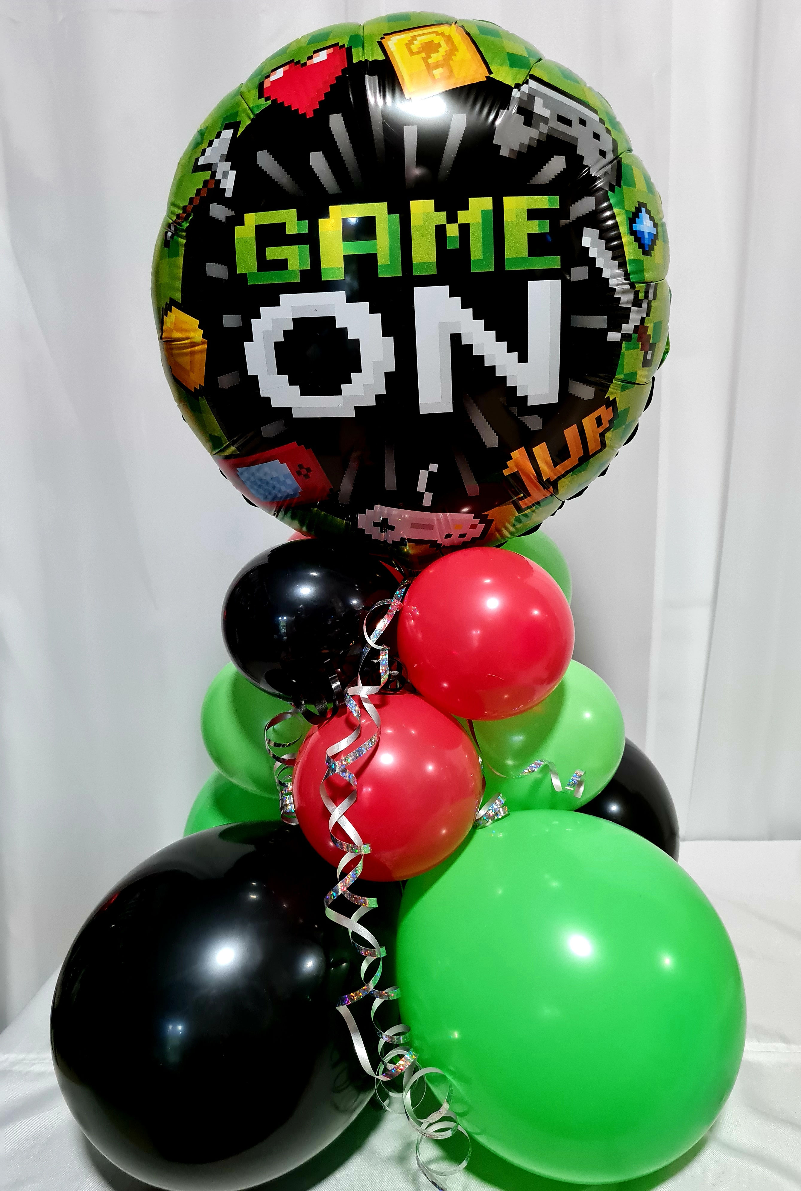 Game on foil balloon with 3 tier balloon table Centrepiece approx.80cm high