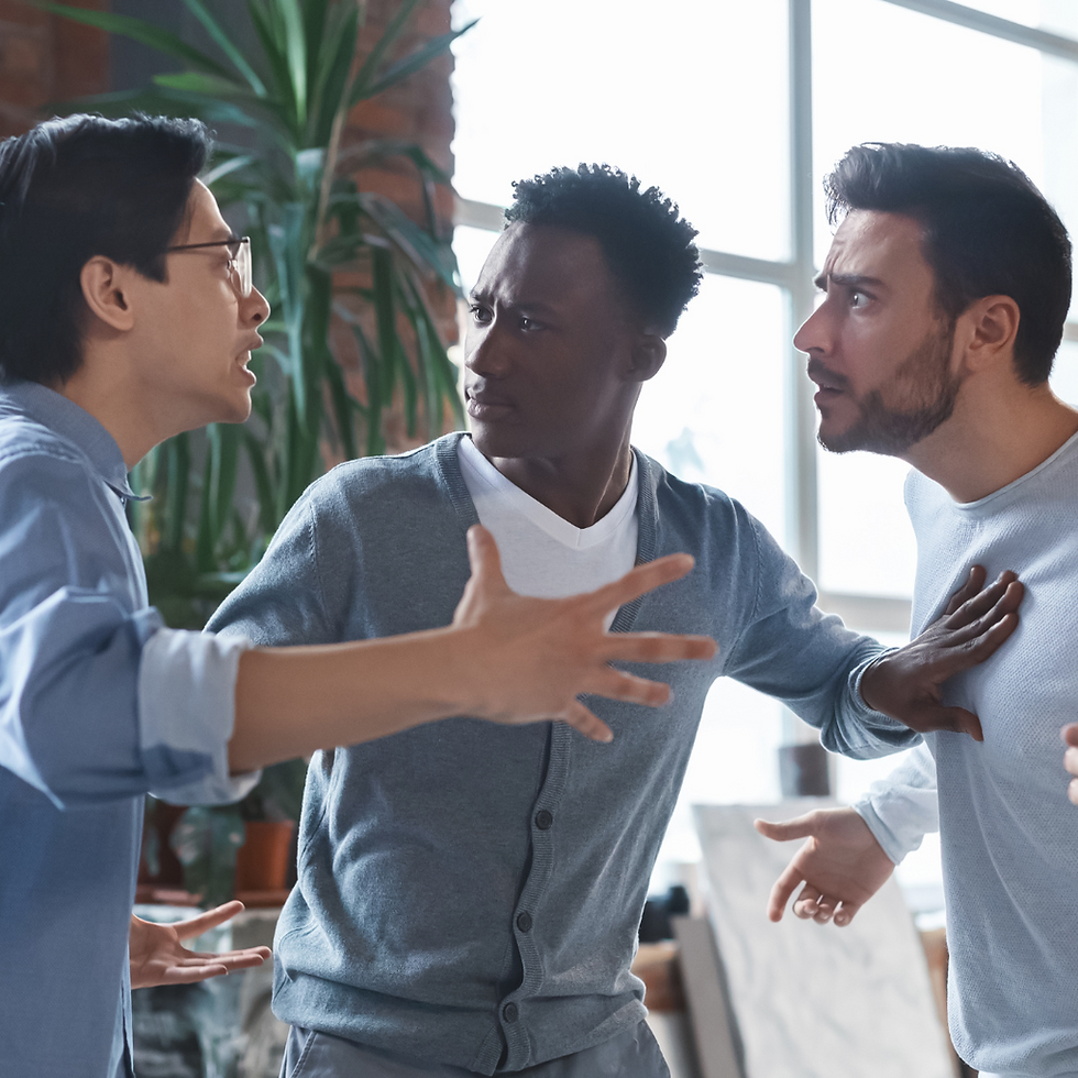 a man between 2 other men separating them from arguing