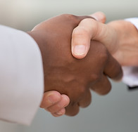 closeup-diverse-business-colleagues-handshake.jpg