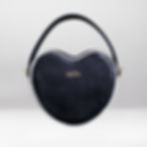 Black heart-shaped purse with white trim and