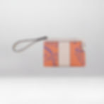 Orange wallet with purple design and white stripe and