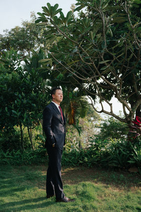 Groom in a dark suit at A&L's intimate wedding – Binh An Village, Vung Tau