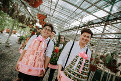 Groomsmen carrying gift trays at T&O's tea ceremony – Saigon