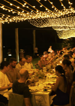 Intimate outdoor wedding dinner under warm string lights – Ana Mandara, Cam Ranh