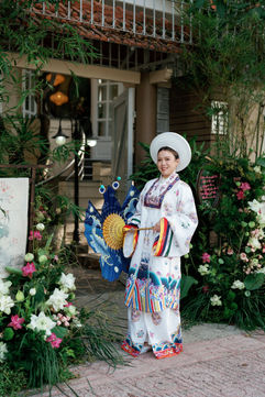 Bride Thanh in white Ao Dai for her Tea Ceremony – tea ceremony in Saigon