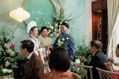 Couple in traditional Ao Dai at Thanh's Le Hoi ceremony – tea ceremony in Saigon