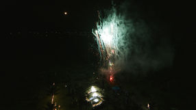 Green and white fireworks display over an intimate wedding event – Da Nang