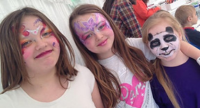 Three girls with face paint