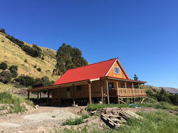 Log house in Port Levy