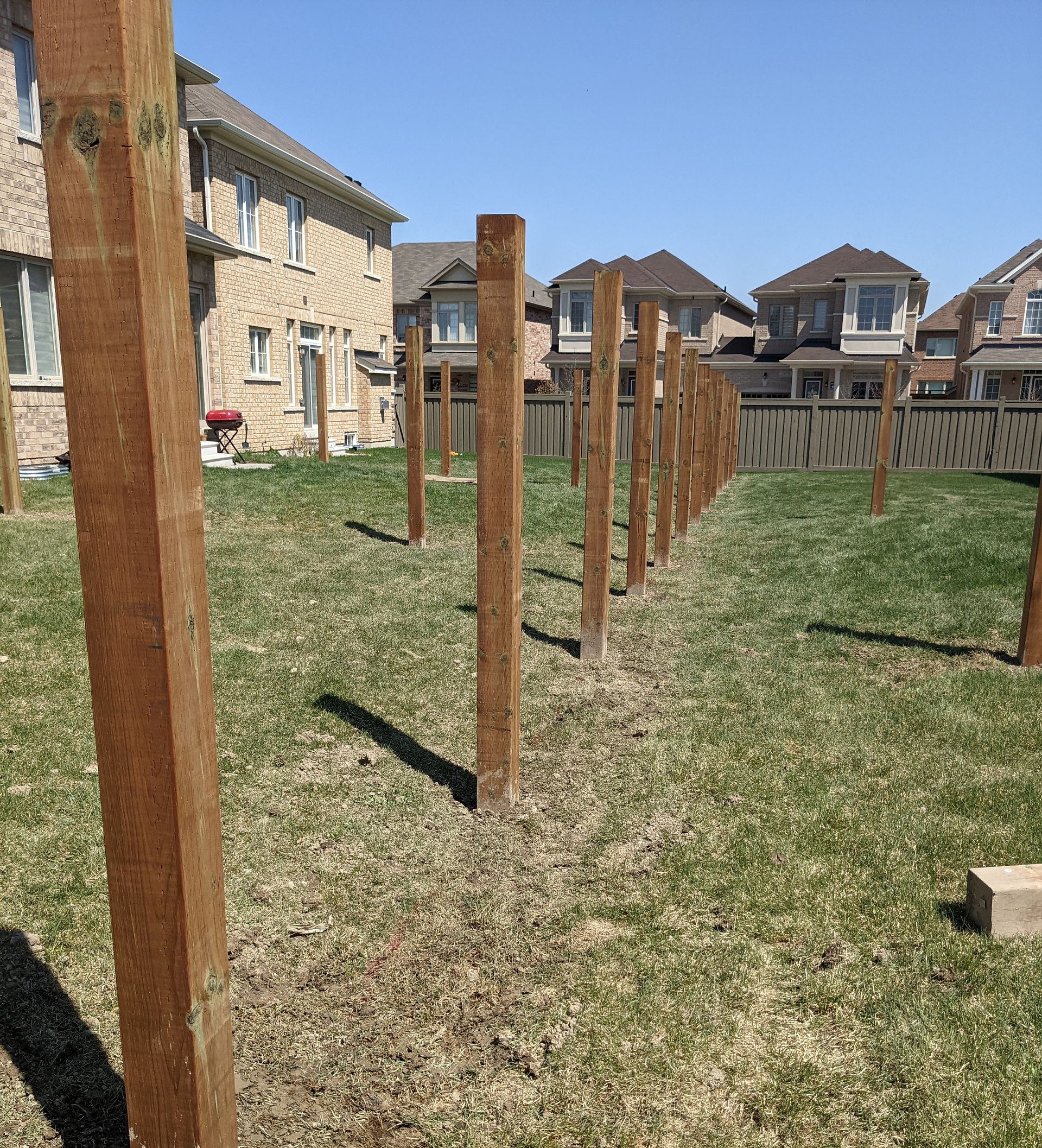 Hire professional for post digging.