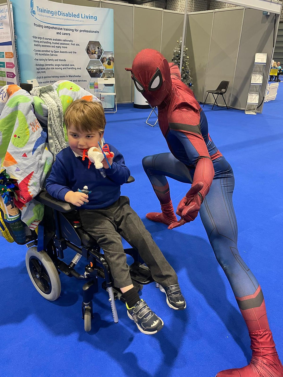 Rowan in his chair, meeting Spider-man
