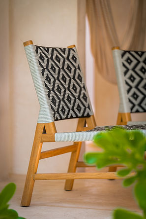 Private outdoor space with kitchen hammock and chukum design at boutique hotel suite in La Manzanilla Mexico