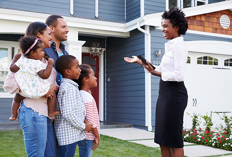Real estate agent helping family purchase a home