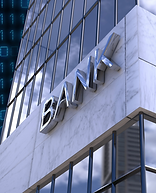 Modern bank building exterior with glass windows