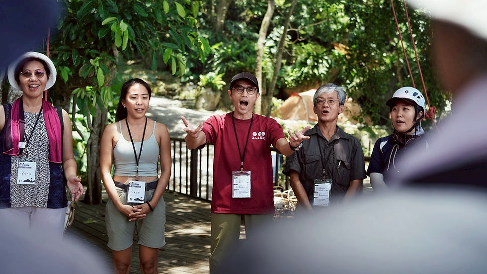 (Center) Jasper Hsu, co-founder of Gao Shan Forest Tribal Ranch