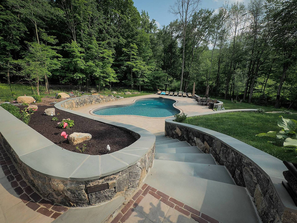 Make Your Inground Pool Stand Out With These 4 Landscape Design Ideas in Rye, NY