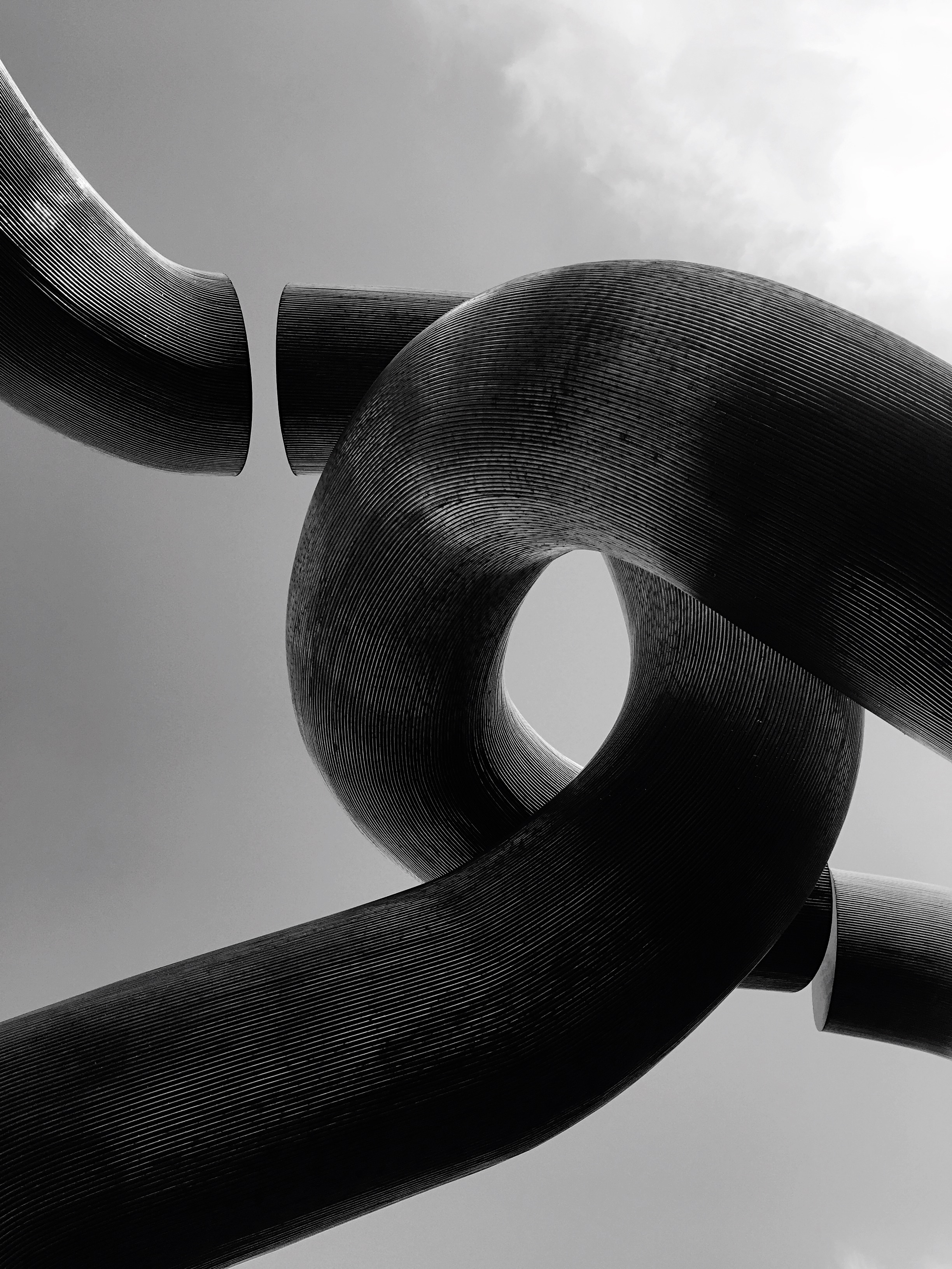 low-angle-view-modern-sculpture-against-sky.jpg